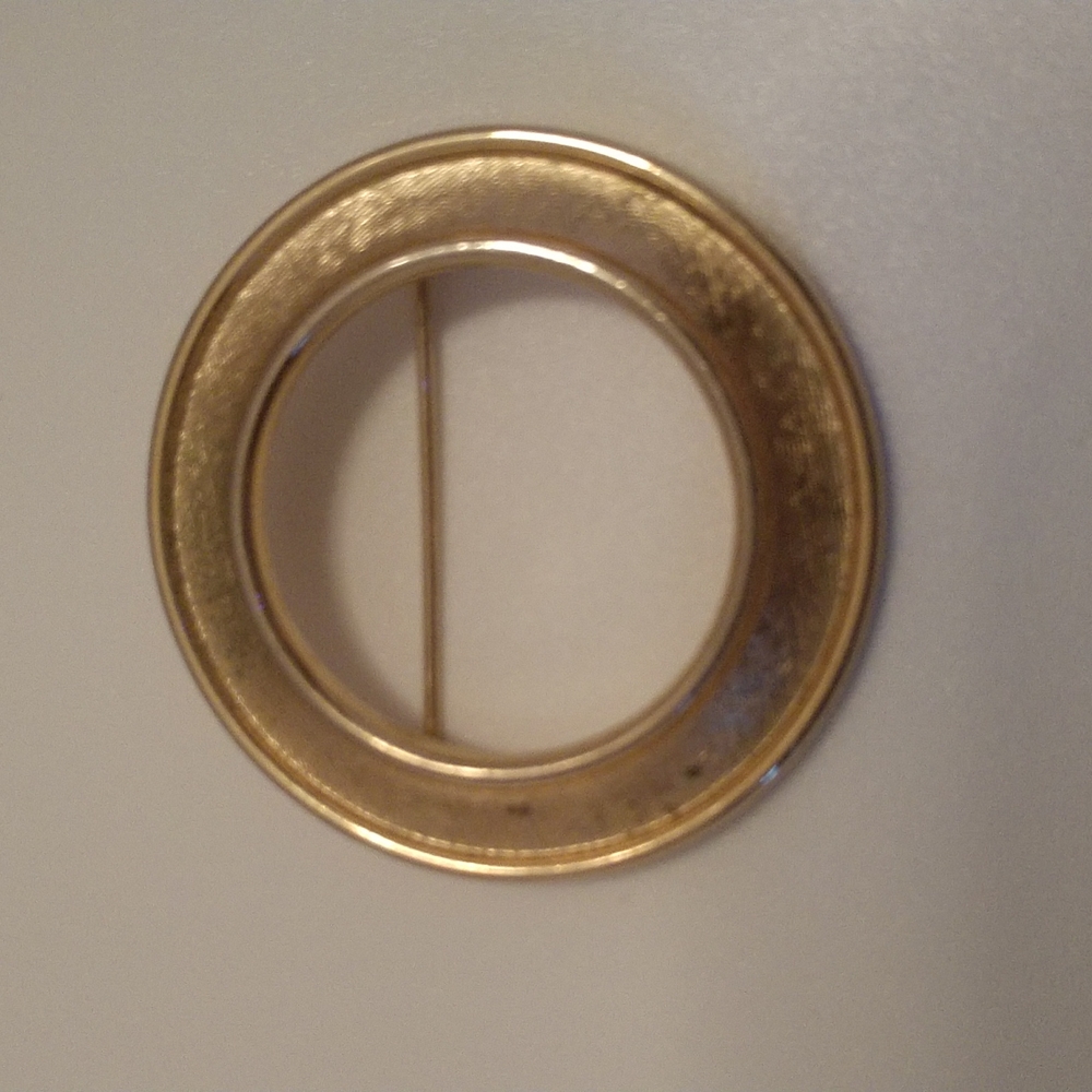 Vintage Trifari Crown goldtone circle brooch